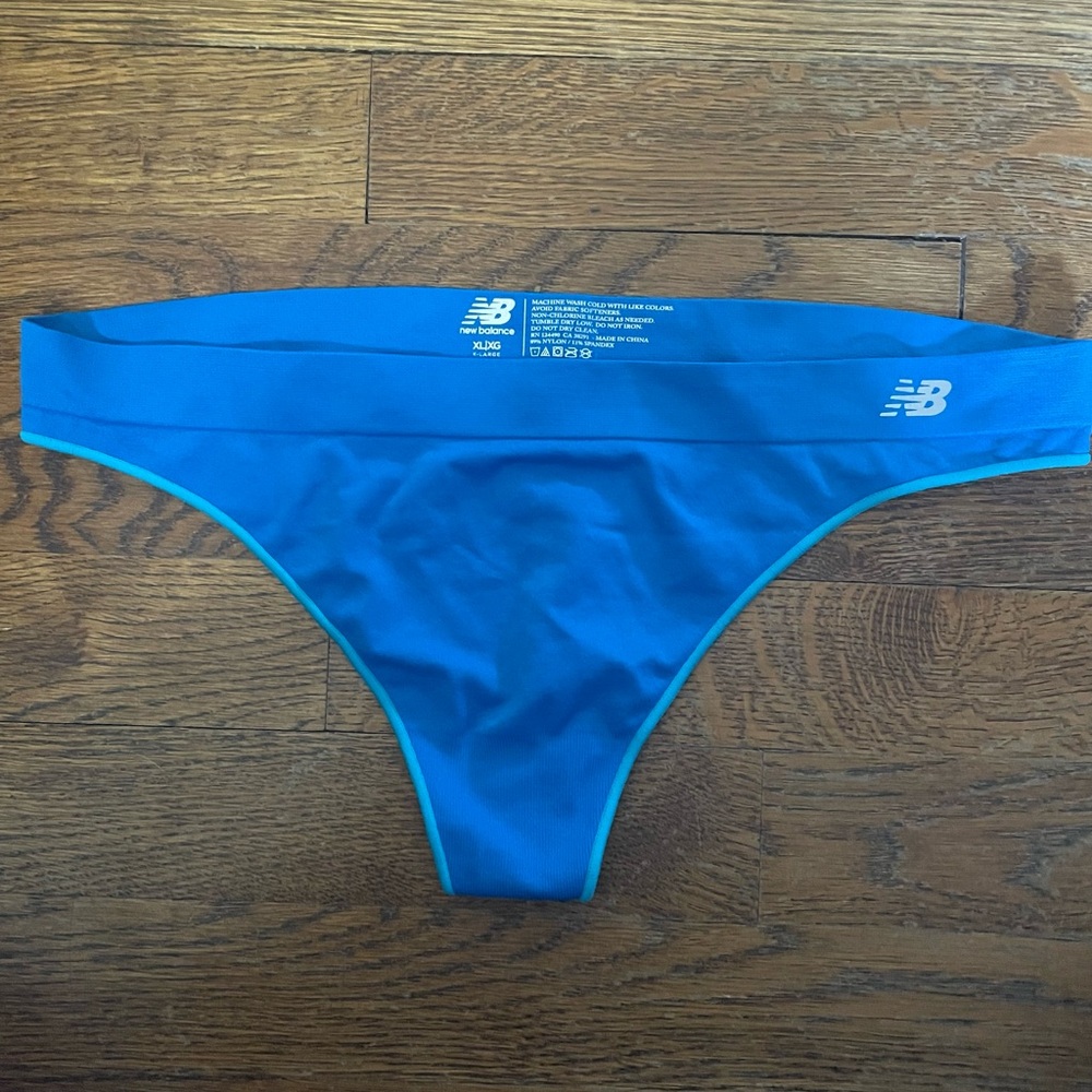 Vintage New Balance athletic style thong, XL. Bright blue, moisture wicking